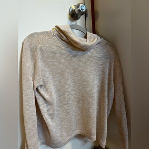 Super stylish and trendy turtleneck shirt with open back. perfect for fall!